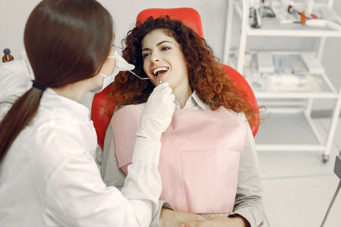 Patient smiling during a routine dental examination